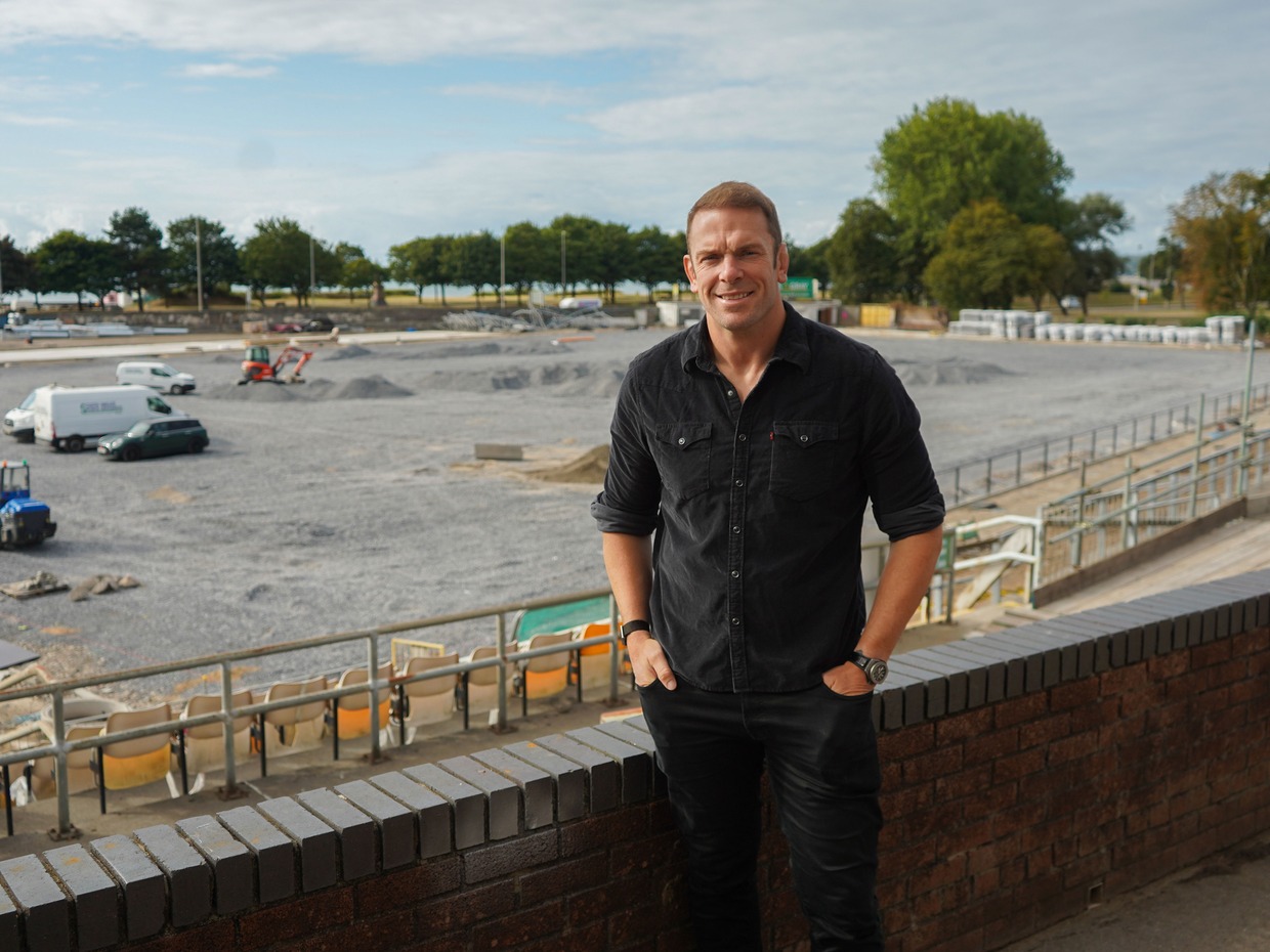 Alun Wyn Jones standing at St Helen's with the stripped pitch and construction work behind him