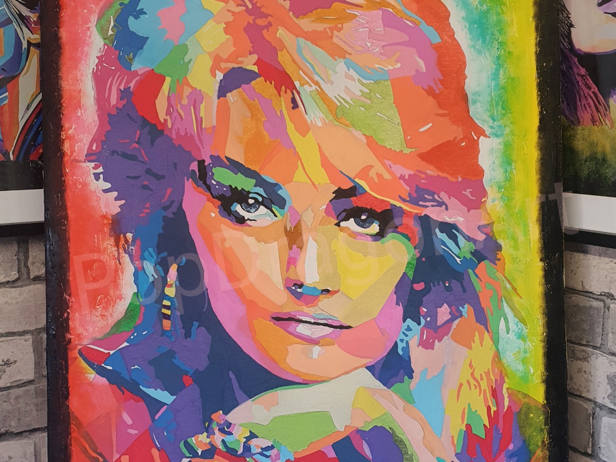 Ian Hendry's pop art portrait of Bonnie Tyler in bright blocks of colour, close-up of the face