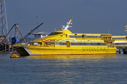 The Rapparee, a yellow Severn Link fast catamaran ferry, moored at Marchwood
