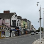 St Helen's Road in Swansea looking along the row of shops from the City Vape corner