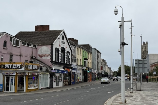 St Helen's Road in Swansea looking along the row of shops from the City Vape corner