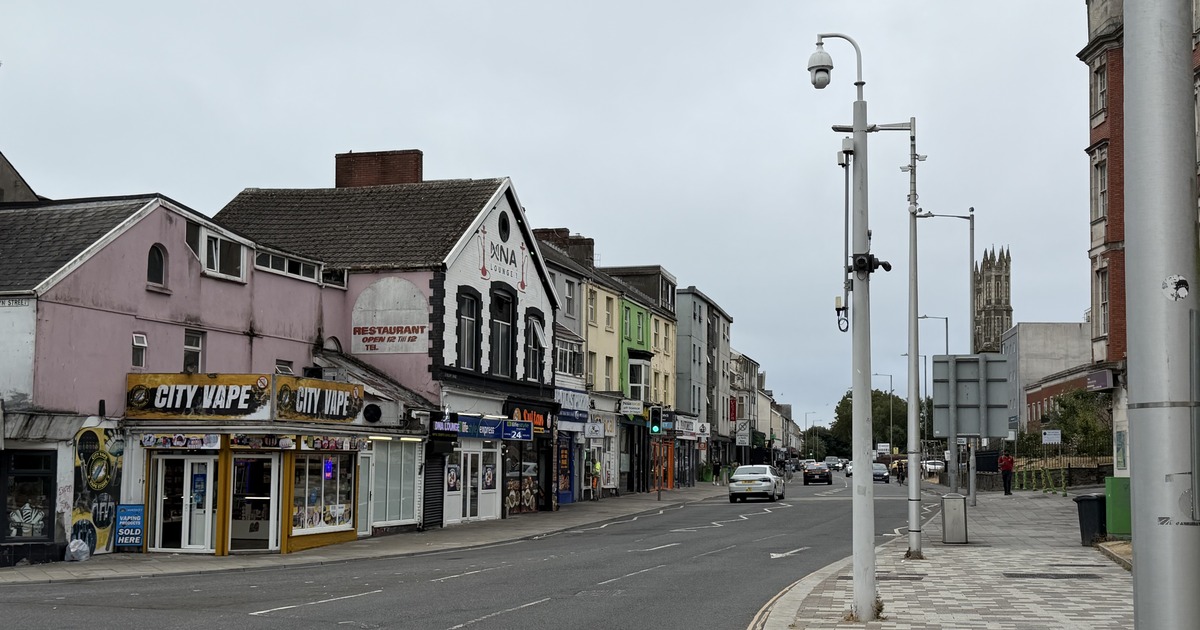 St Helen's Road in Swansea looking along the row of shops from the City Vape corner