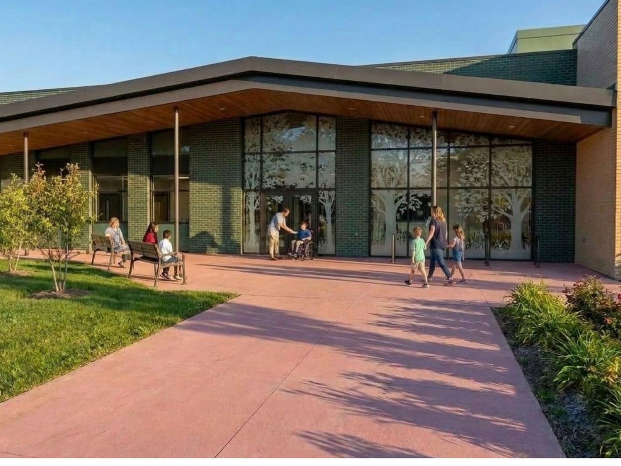 Architect's concept render of the Ysgol Calon Lân entrance, with glazed doors etched with tree designs, a timber canopy and children and families outside