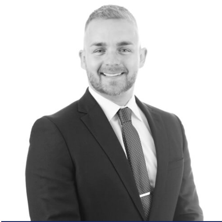 A black and white image of solicitor, Ben Garvey