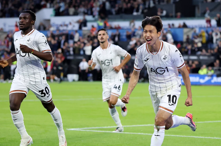 Swansea City winger Eom Ji-sung celebrating his goal against Watford