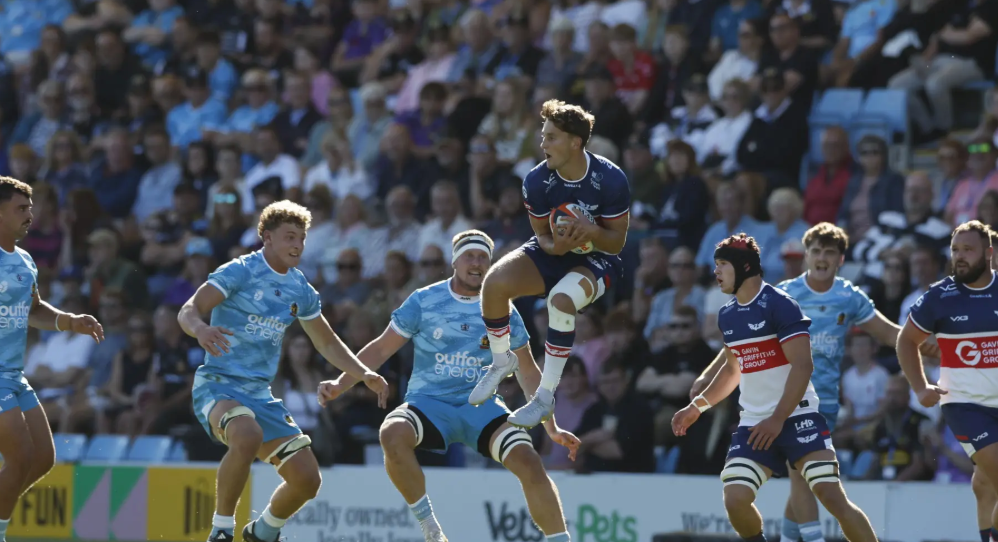 Scarlets players in action against Exeter Chiefs at Sandy Park