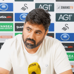 Swansea City head coach Vitor Matos speaking at a press conference