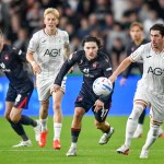 Swansea City's Josh Key under pressure from Wrexham's Callum O'Hare at the Swansea.com Stadium