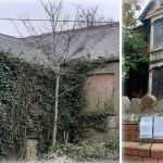 The empty Neath Road house in Maesteg, its render overgrown with ivy, alongside its boarded-up front bay with legal notices on the garden wall