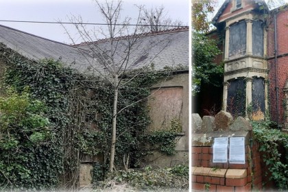 The empty Neath Road house in Maesteg, its render overgrown with ivy, alongside its boarded-up front bay with legal notices on the garden wall