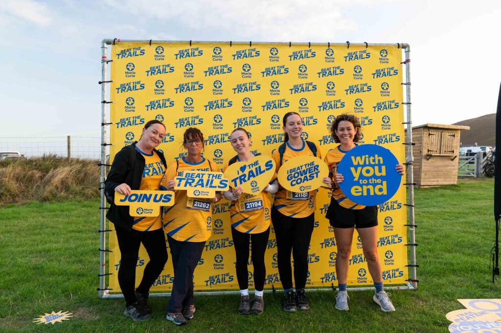 Marie Curie staff participants at the Beat the Gower Coast photo board