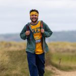 Matthew Haywood walking the Beat the Gower Coast trek for Marie Curie