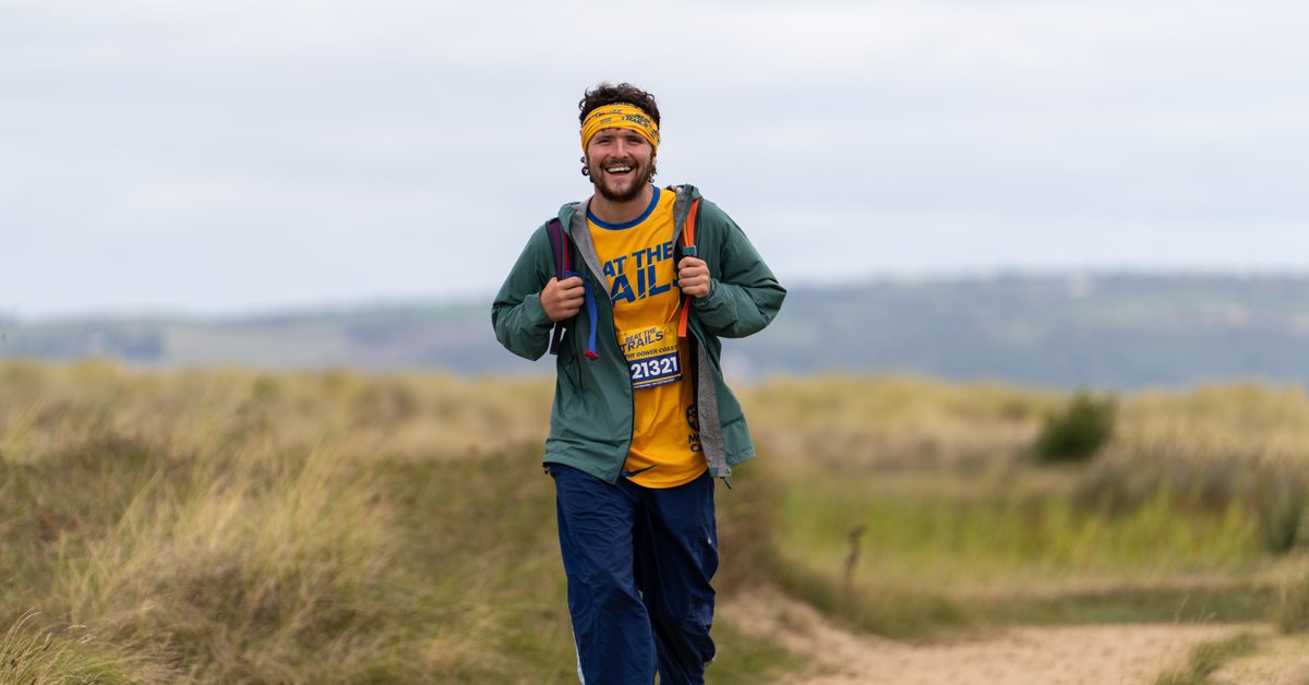 Matthew Haywood walking the Beat the Gower Coast trek for Marie Curie
