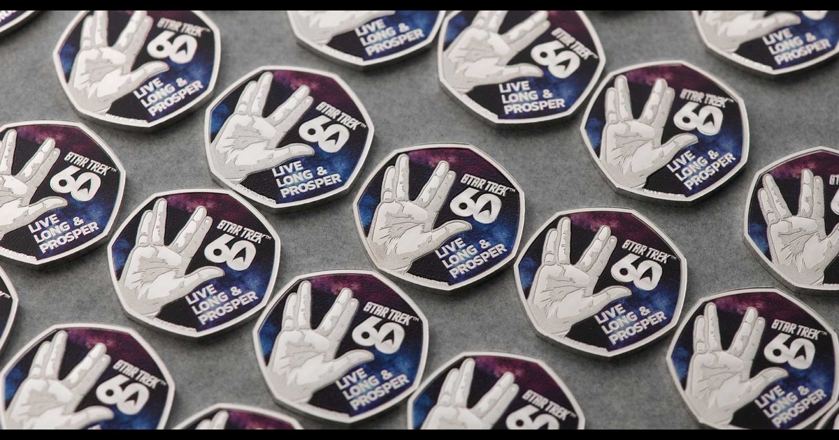 Two Star Trek 60th anniversary 50p coins, one with the Vulcan salute and Live Long & Prosper, one with four starships against a colour nebula