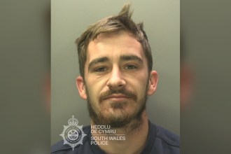 South Wales Police custody photograph of Caeran Evans, 27, from Penlan, Swansea