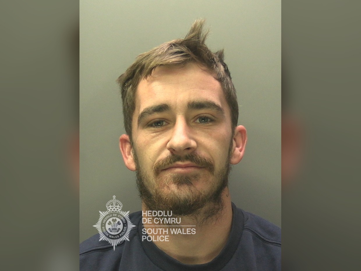 South Wales Police custody photograph of Caeran Evans, 27, from Penlan, Swansea