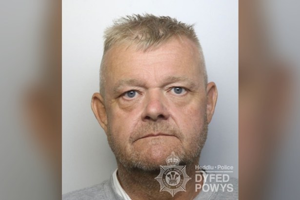 Dyfed-Powys Police custody photograph of Ian Stanton, a man with short spiky fair hair and grey stubble