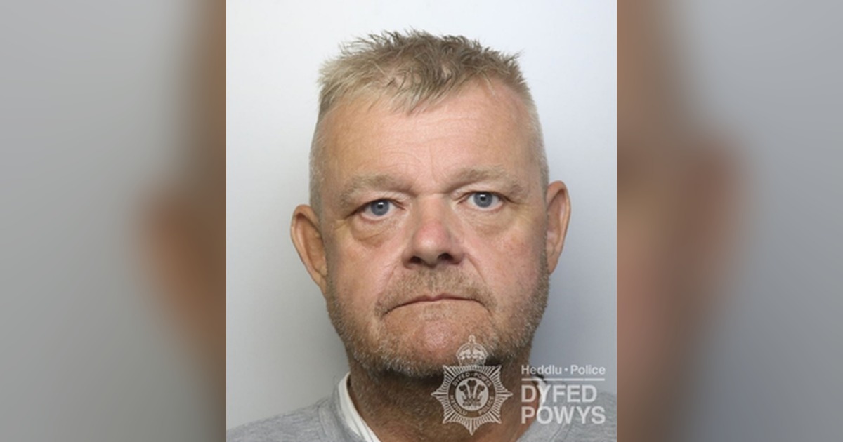 Dyfed-Powys Police custody photograph of Ian Stanton, a man with short spiky fair hair and grey stubble
