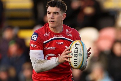 Scarlets centre Joe Hawkins with the ball in hand during a URC match