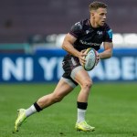 Ospreys scrum-half Kieran Hardy running with the ball