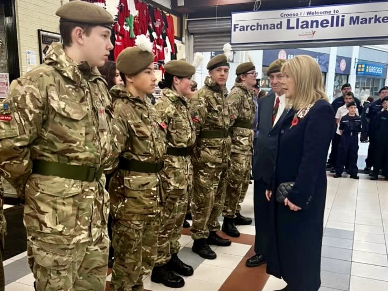 Lord-Lieutenant of Dyfed Sara Edwards with Army, Sea and Air cadets at the launch of Llanelli's Poppy Appeal