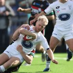 Swansea RFC full-back Mat Protheroe carries the ball into a tackle against Ebbw Vale