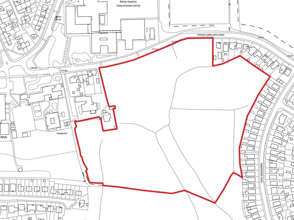 Ordnance Survey site plan with the proposed Ysgol Calon Lân site edged in red, south of Mynydd Garnllwyd Road and opposite Bishop Vaughan Catholic School, with the houses of Windermere Road along its eastern edge