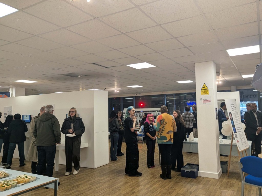 Guests chatting among the exhibits at Oriel Science in Swansea during its 10th anniversary celebration