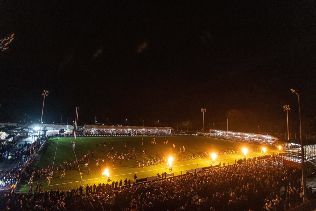 Flames shooting up along the touchline as the Ospreys run out under the floodlights at a packed St Helen’s at night